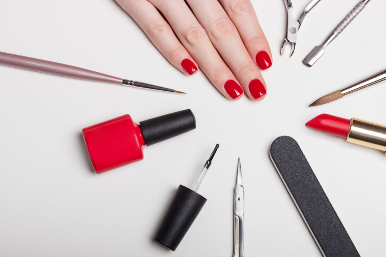 Beautifully,Manicured,Nails,On,The,Desktop,With,Tools,For,Manicure